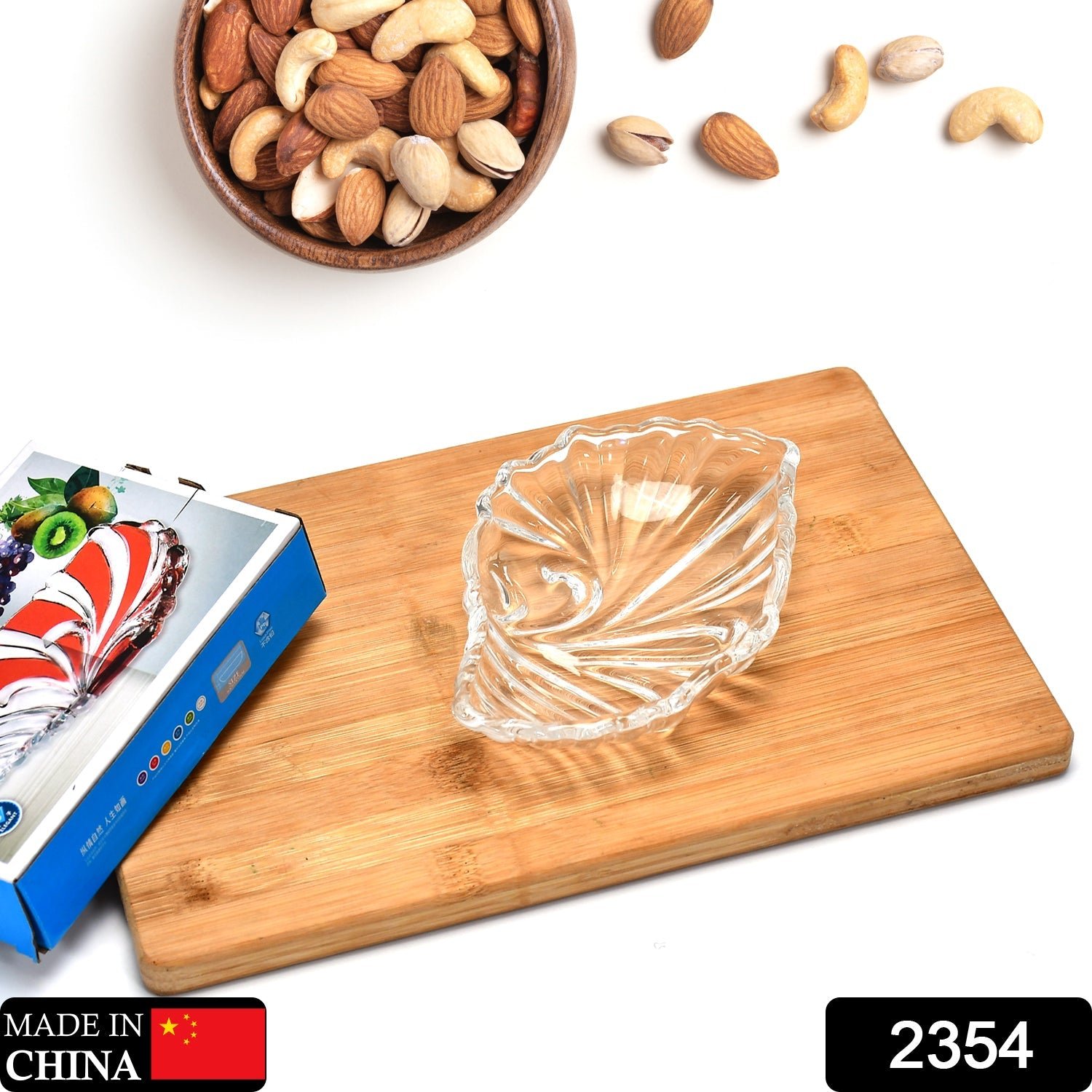 Leaf shaped Glass Serve tray of snacks, Mukhwaas, and ice cream.