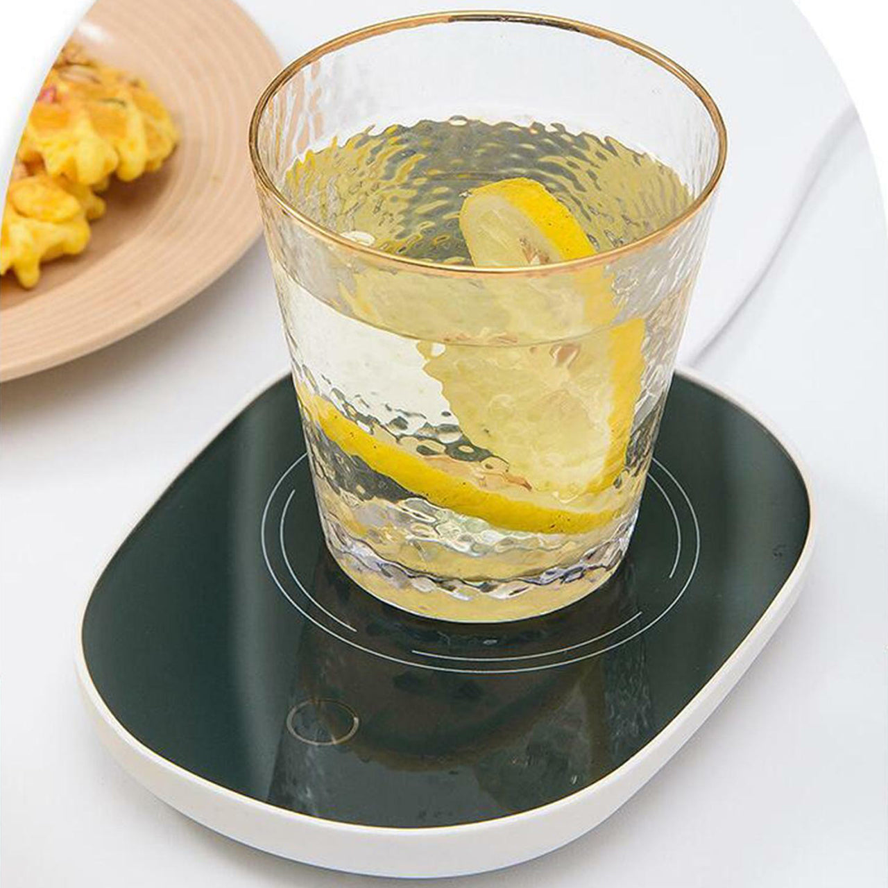 Coffee Mug Warmer For Having Coffee Along With The Warmer That Keeps It Hot.